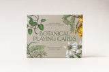 Box of Botanical Playing Cards with floral design on a white background