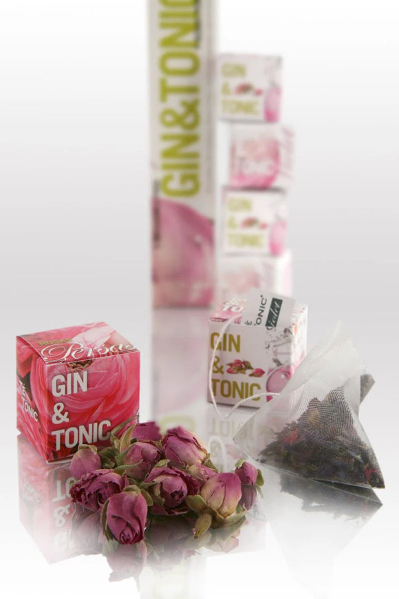 Tea packaging with pink flowers and 'Gin & Tonic' branding on a white background