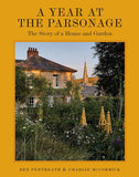 Book cover of 'A Year at the Parsonage' with a house and garden scene on a yellow background.