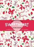Packaging of 'All Wrapped Up Sweetheart' by Erin Duncan with decorative patterns and text.