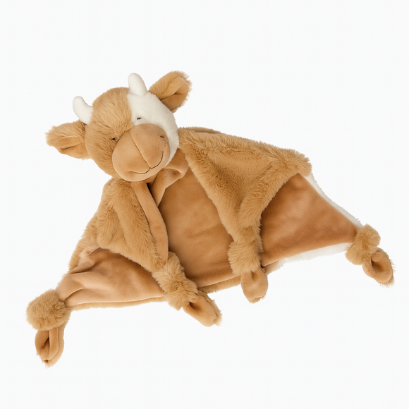 Plush toy with a cow design on a white background