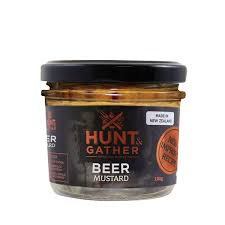 Jar of beer mustard with 'Hunt Gather' branding on a white background