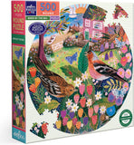 Round puzzle box with birds by the sea design and colorful artwork