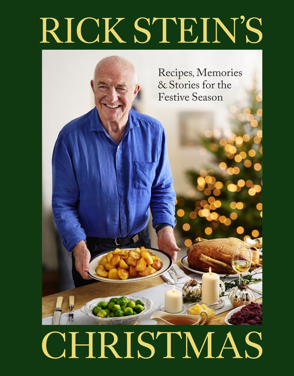 Book cover of 'Rick Stein's Christmas' with a man holding food in a festive setting.