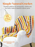 Crocheted blanket on a chair with book cover text 'Simple Natural Crochet' by Susan Ritchie and Karen Miller.