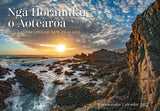 A scenic coastal landscape print or calendar cover showing rocky shores, ocean waves, and a bright sun low on the horizon under a blue sky with scattered clouds. Large text at the top reads 'Ngá Horanuku o Aotearoa' with smaller text 'Landscapes of New Zealand,' and 'Maramataka Calendar 2027' appears at the bottom right.