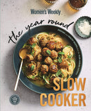 Cookbook cover featuring a dish of meatballs and noodles with 'The Year Round Slow Cooker' text.